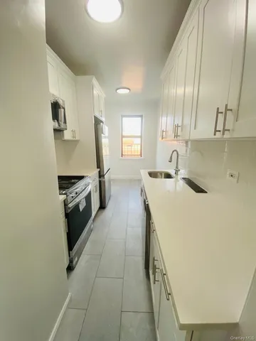 $559,000 | 61-09 39th Avenue, Unit J5 | Woodside