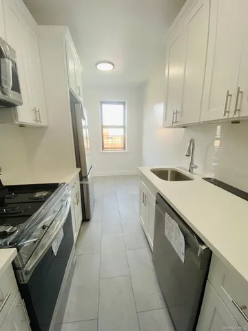 $559,000 | 61-09 39th Avenue, Unit J5 | Woodside