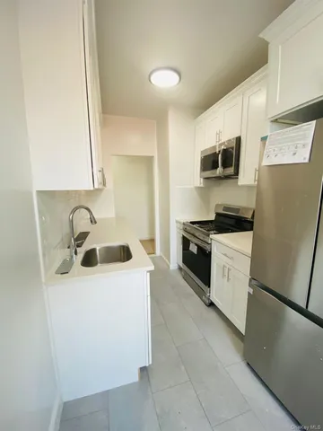 $559,000 | 61-09 39th Avenue, Unit J5 | Woodside