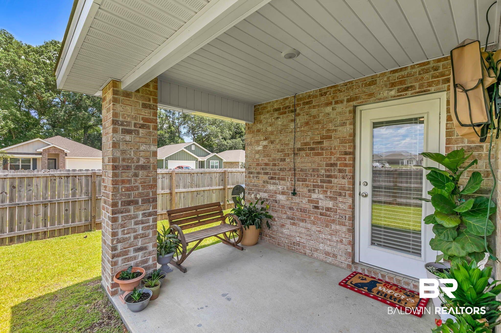 17217 REFLECTION Street Loxley, AL 36551 - Photo 40 of 83 Covered Rear Patio .