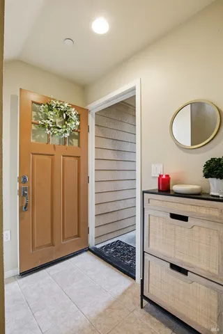a bathroom with a glass door shower