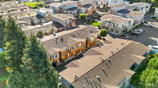 an aerial view of residential house with an outdoor space