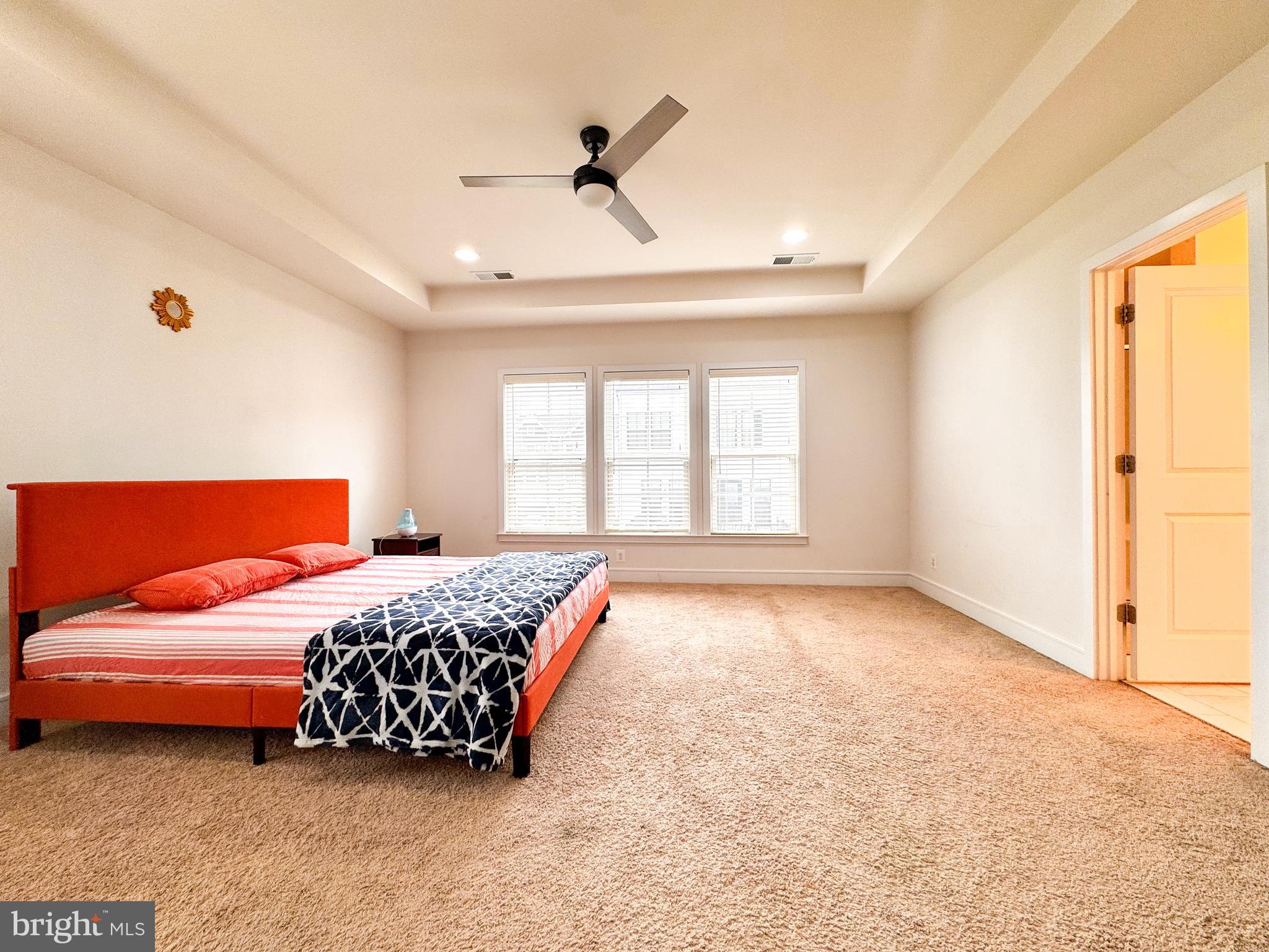 25419 Reed Orchard Terrace Chantilly, VA 20152 - Photo 30 of 47 a bedroom with a bed and a window