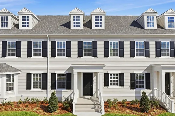 a kitchen with stainless steel appliances a refrigerator stove microwave and sink