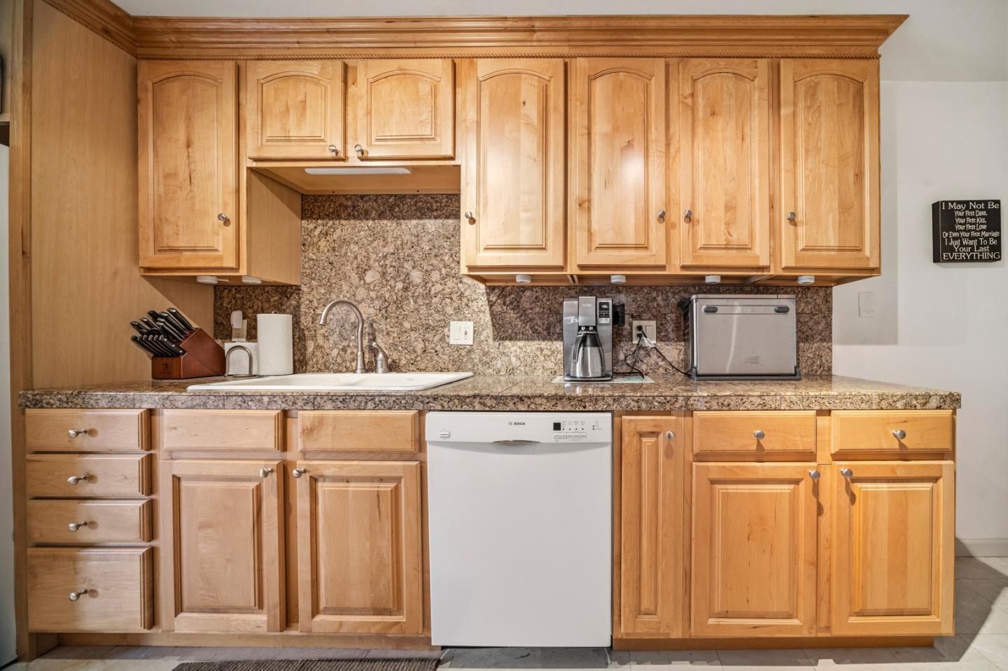 17 Shepherds Knoll Road Monterey, CA 93940 - Photo 13 of 37 a kitchen with granite countertop cabinets and window