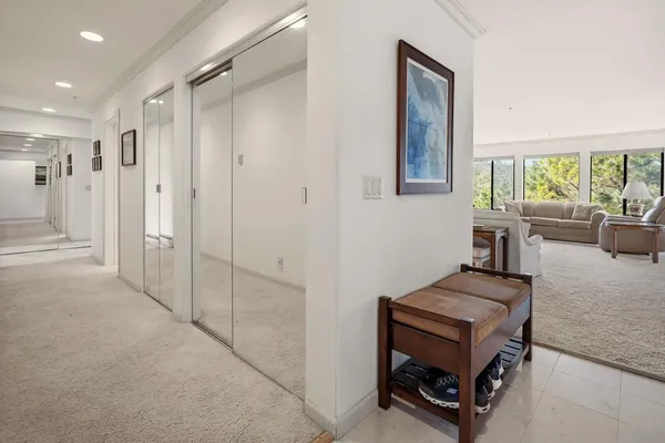 a view of a livingroom with furniture and windows
