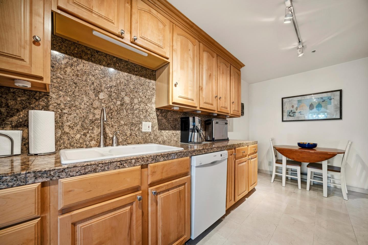 17 Shepherds Knoll Road Monterey, CA 93940 - Photo 10 of 37 a kitchen with stainless steel appliances granite countertop a sink and cabinets