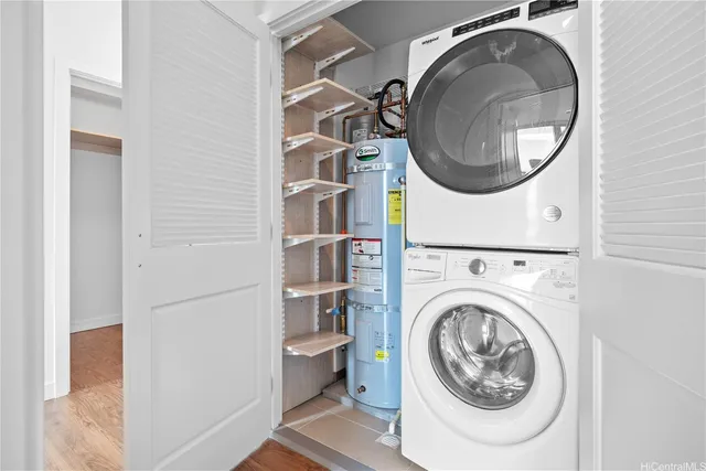 a view of a hallway with washer and dryer