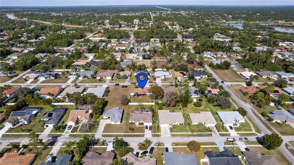 2607 8th Street West Lehigh Acres, FL 33971 - Photo 43 of 48 an aerial view of residential houses with city view