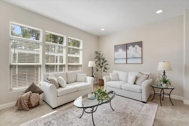 a kitchen with stainless steel appliances kitchen island granite countertop a sink and cabinets