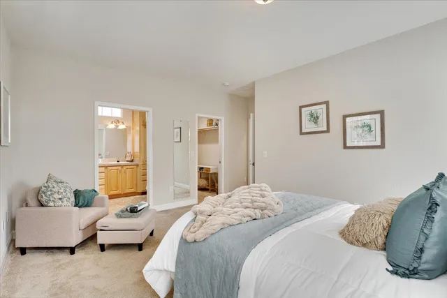 a bed room with a bed and a window