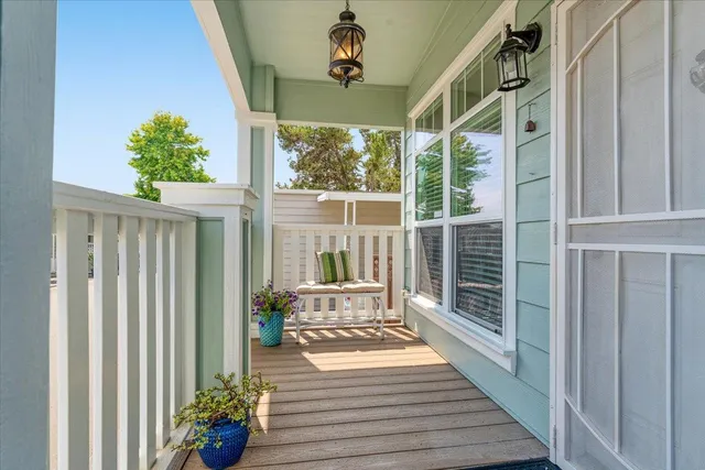 a porch with wooden floor