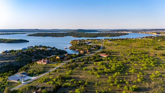 a view of a lake with a building in the background