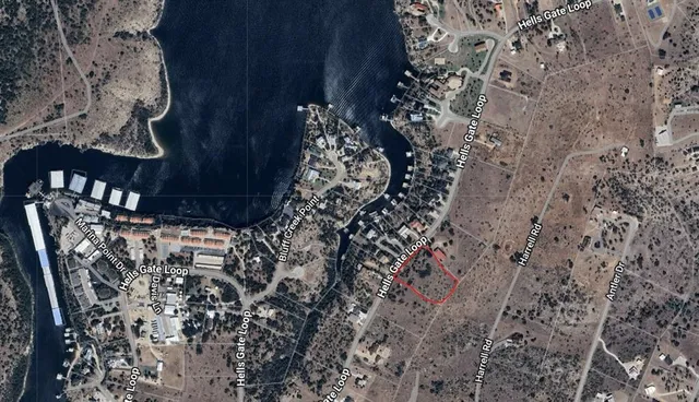 a view of a lake with a big yard