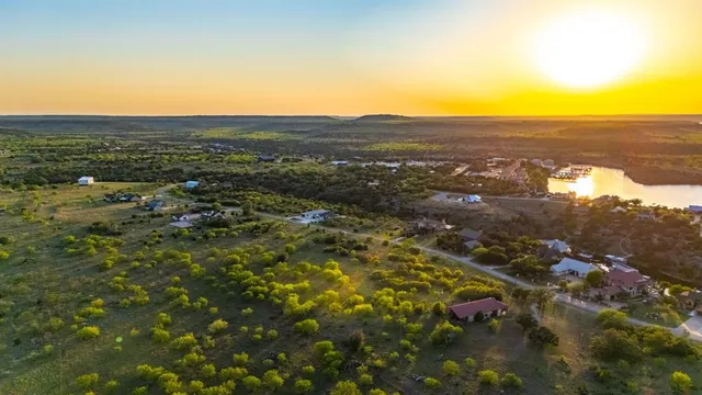 an aerial view of residential building and ocean