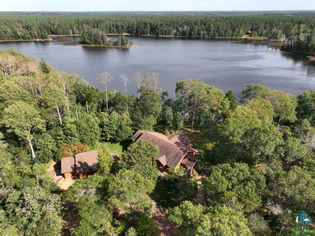 10115 Island Lake Road Solon Springs, WI 54873 - Photo 4 of 56 Aerial view of property and surrounding area featuring a forest and a nearby body of water