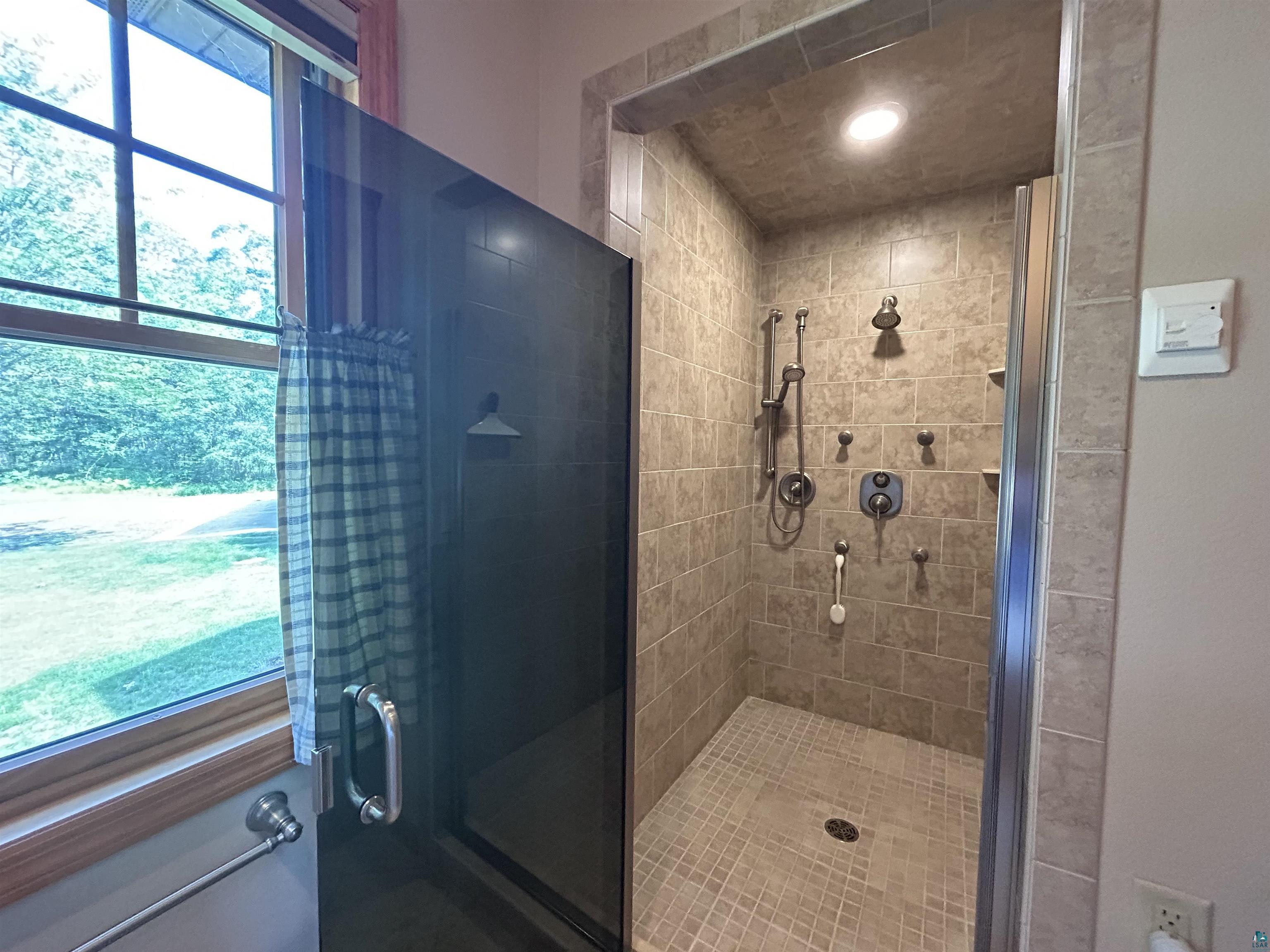 10115 Island Lake Road Solon Springs, WI 54873 - Photo 47 of 56 Bathroom featuring a stall shower