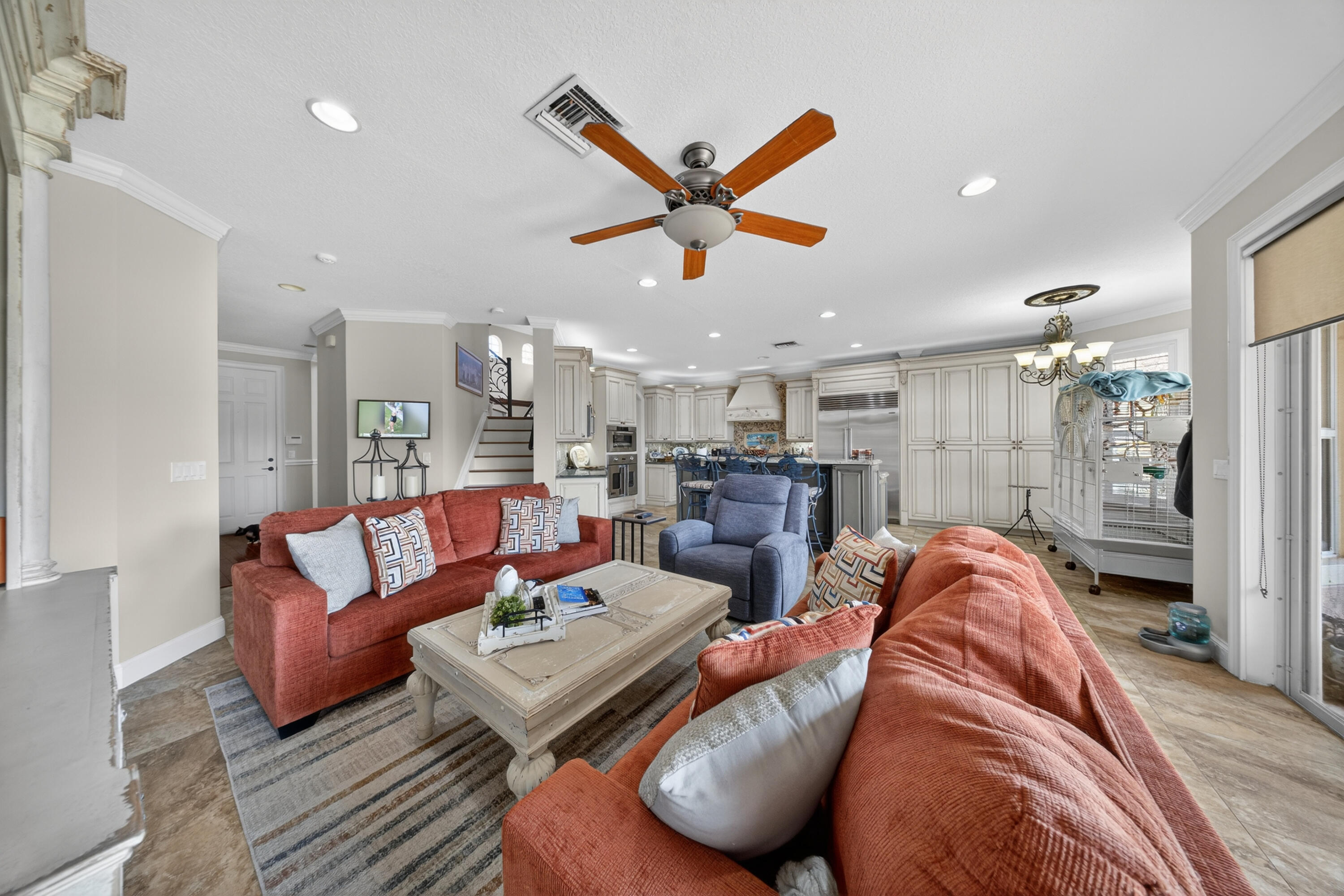 1315 Southeast Conference Circle Stuart, FL 34997 - Photo 11 of 55 a living room with furniture and a view of kitchen