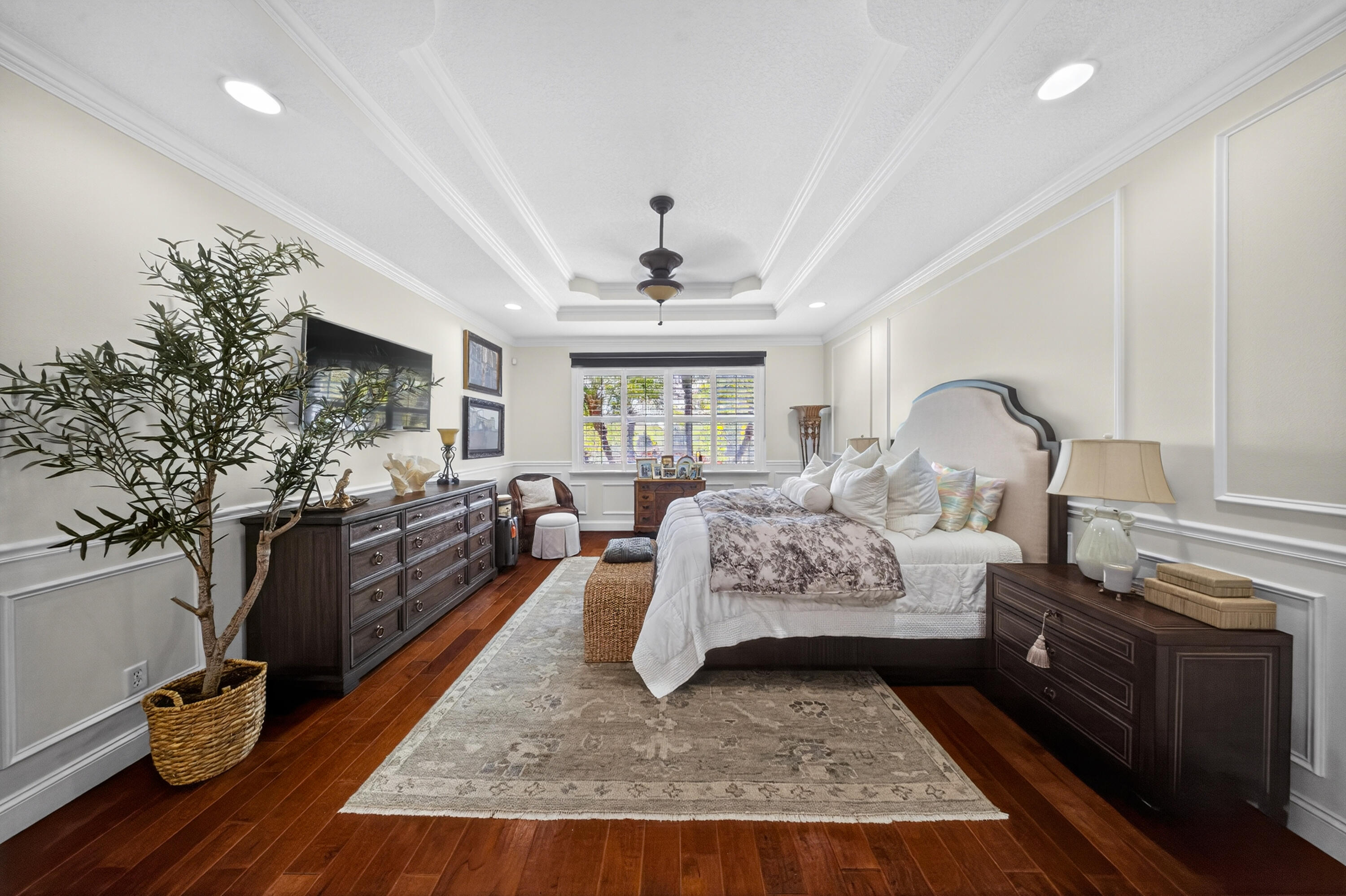 1315 Southeast Conference Circle Stuart, FL 34997 - Photo 24 of 55 a living room with furniture rug and wooden floor