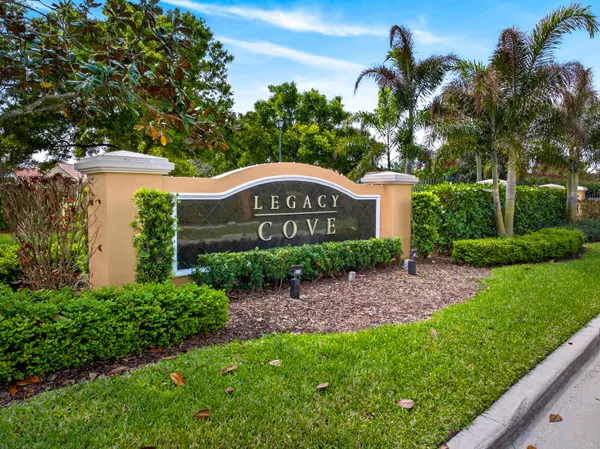a spacious bedroom with a bed and a flat screen television