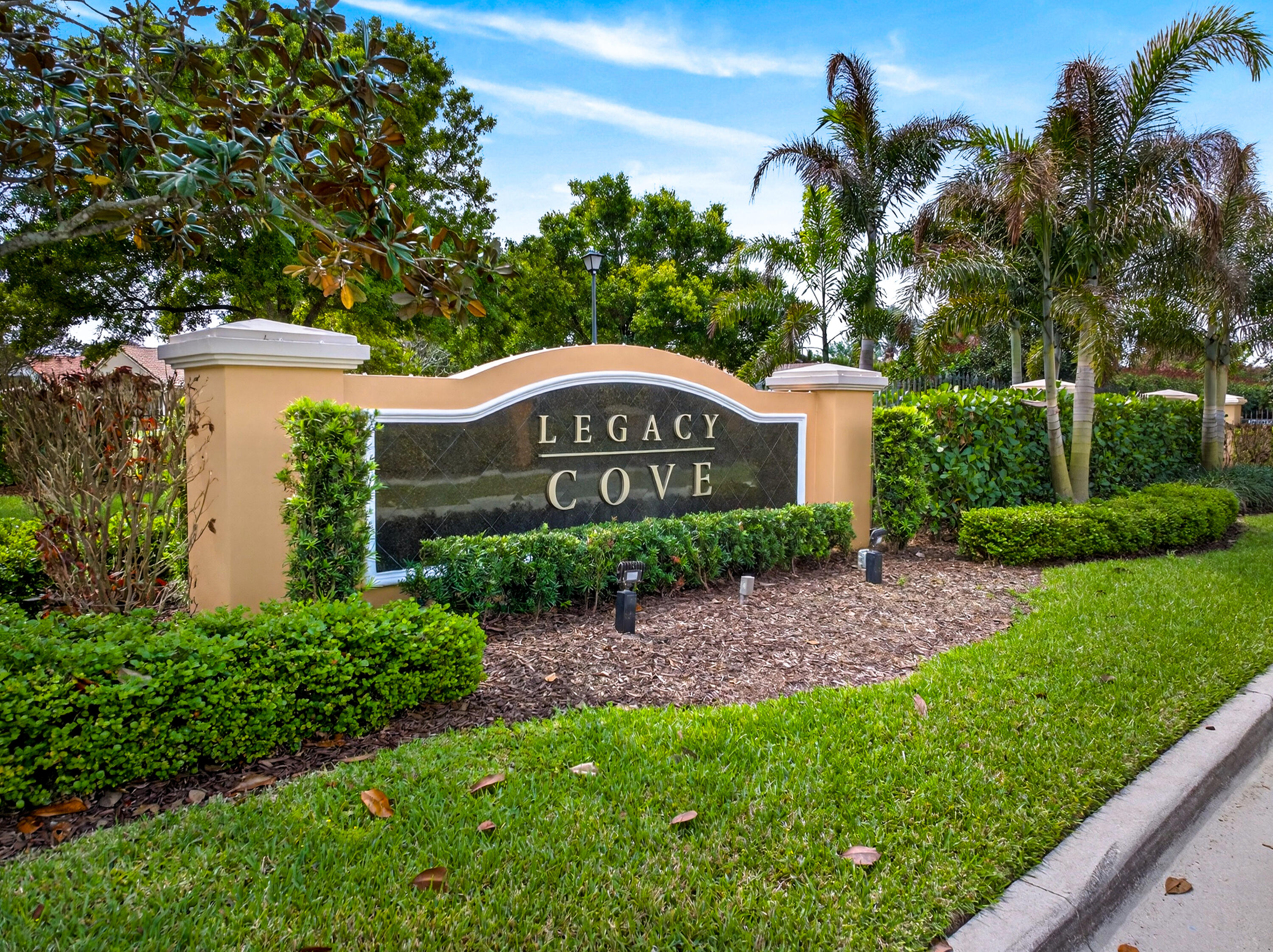1315 Southeast Conference Circle Stuart, FL 34997 - Photo 25 of 55 a sign board with a house and a yard in the back