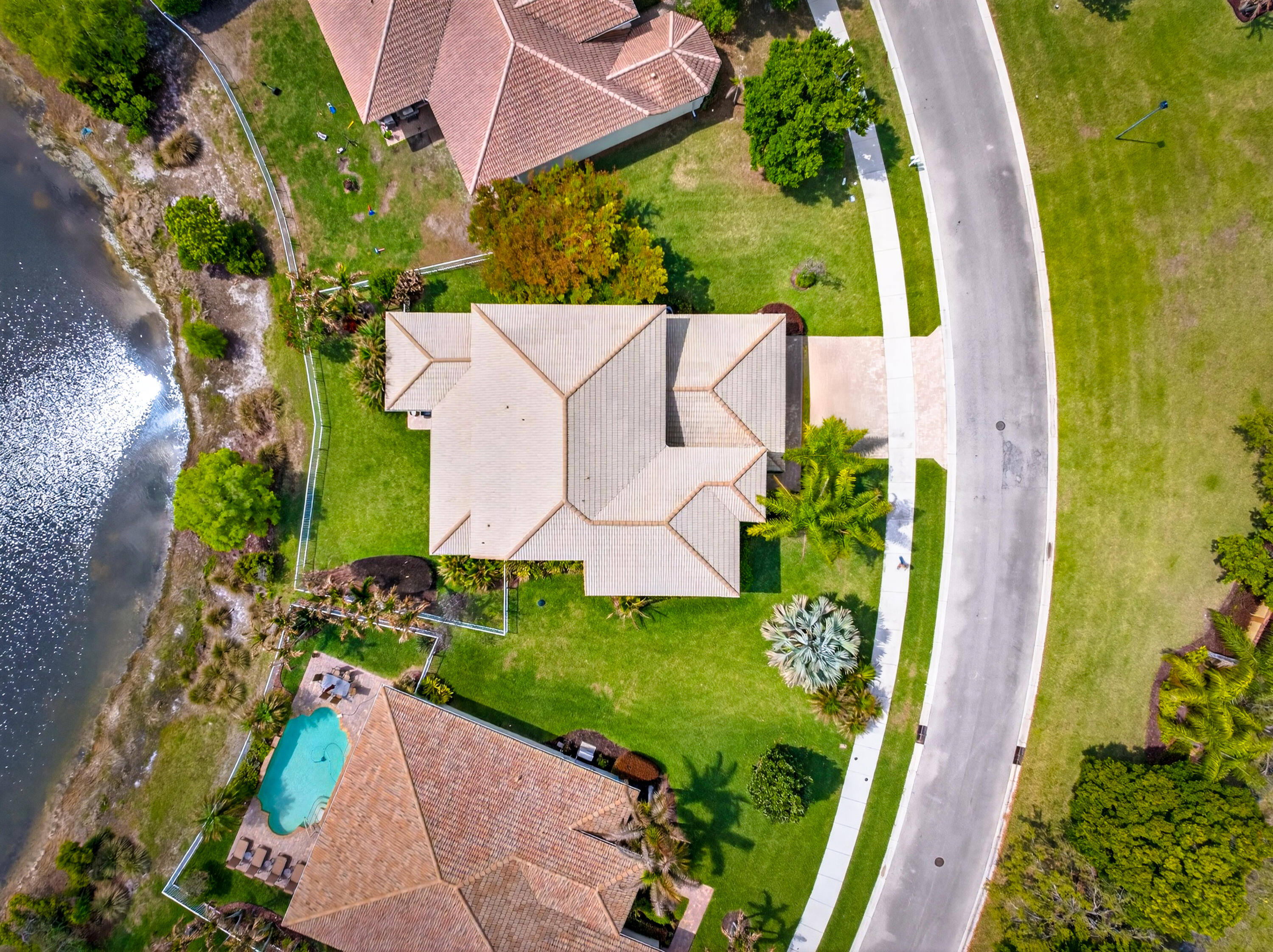 1315 Southeast Conference Circle Stuart, FL 34997 - Photo 29 of 55 an aerial view of a house with a garden