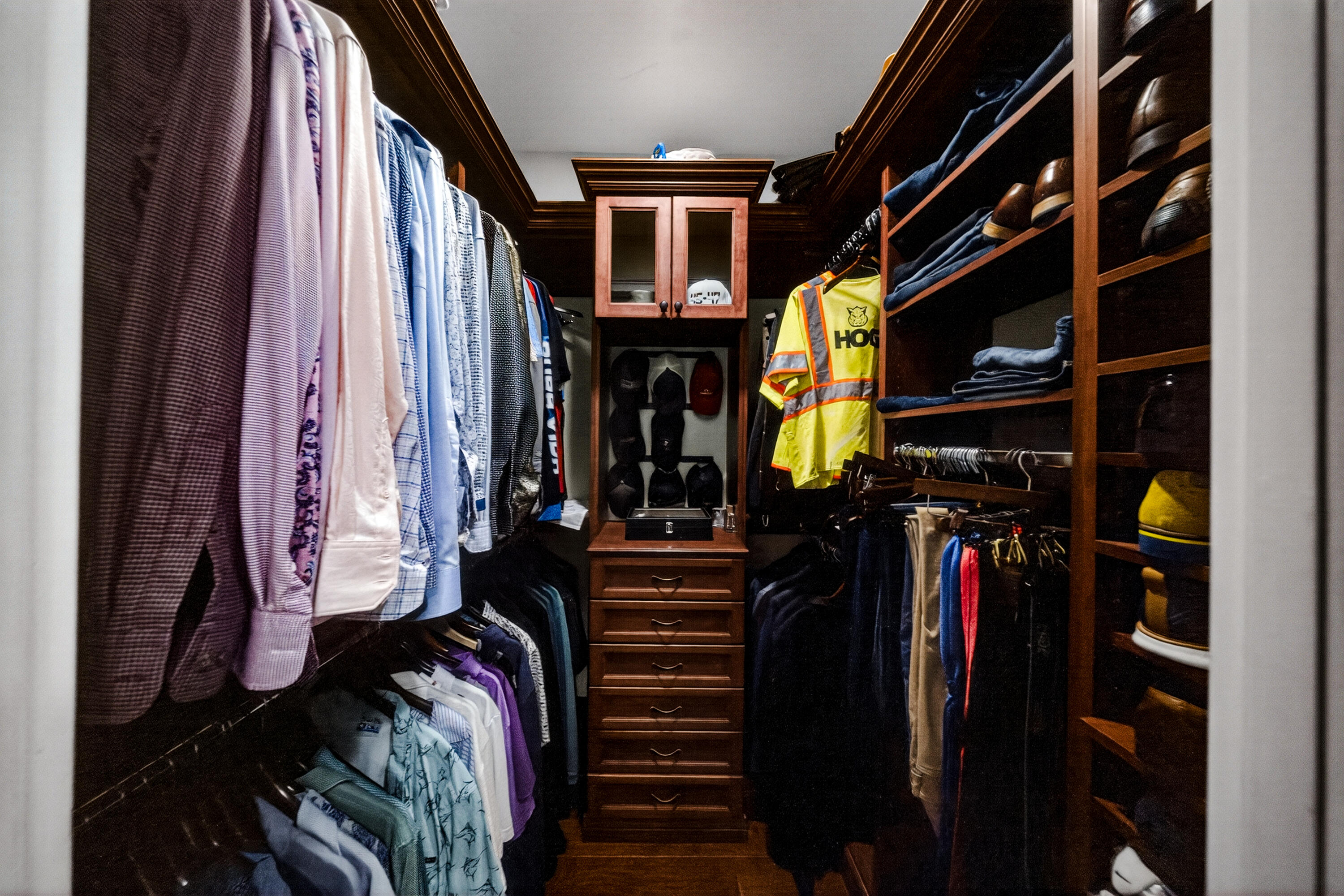 1315 Southeast Conference Circle Stuart, FL 34997 - Photo 32 of 55 a view of walk in closet with clothes and shoes