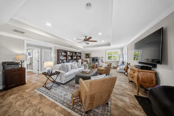 a bathroom with a double vanity sink toilet mirror and shower