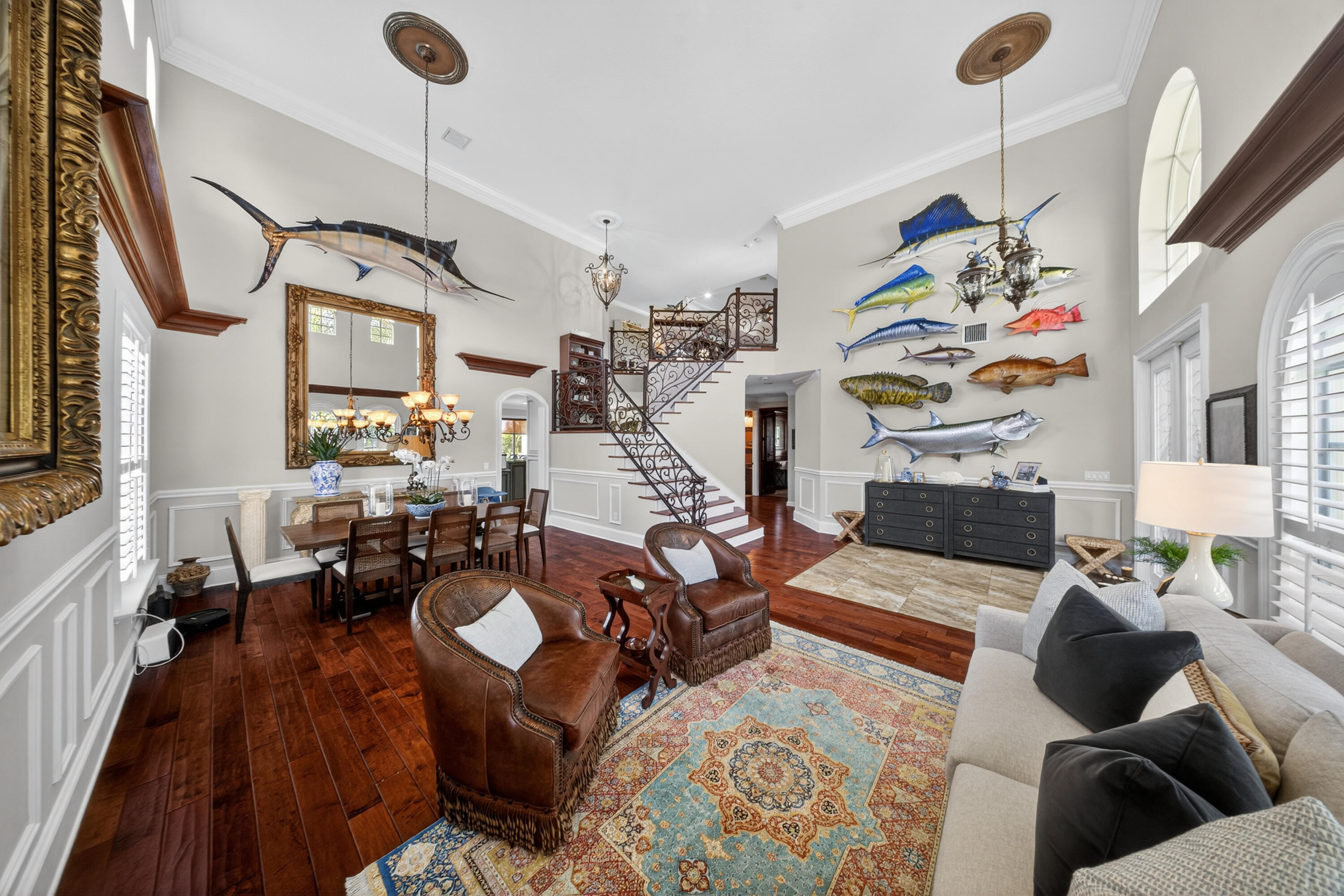 1315 Southeast Conference Circle Stuart, FL 34997 - Photo 7 of 55 a living room with furniture and wooden floor