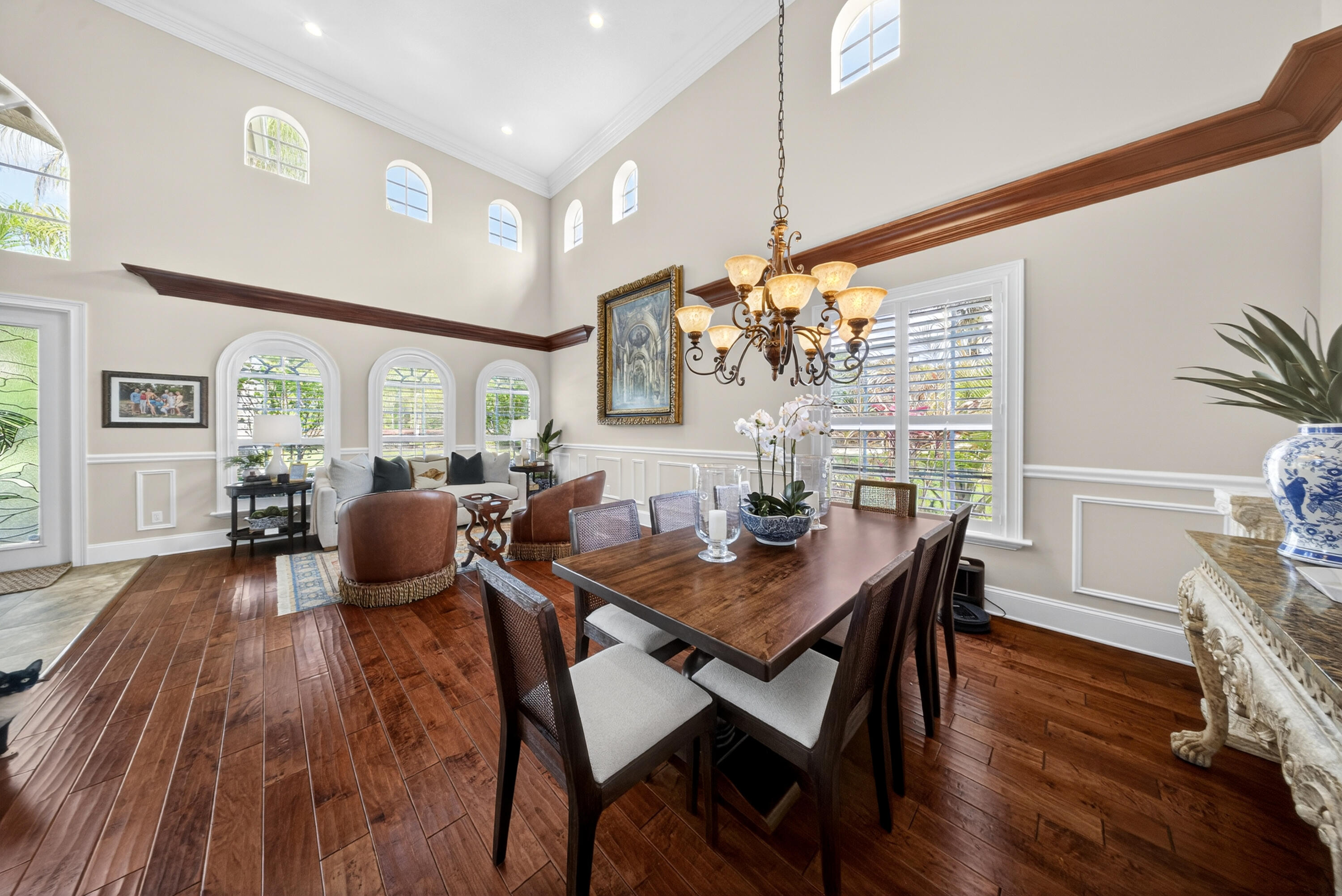 1315 Southeast Conference Circle Stuart, FL 34997 - Photo 8 of 55 a view of a dining room with furniture and wooden floor