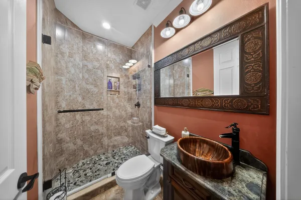 a living room with furniture fireplace and a flat screen tv