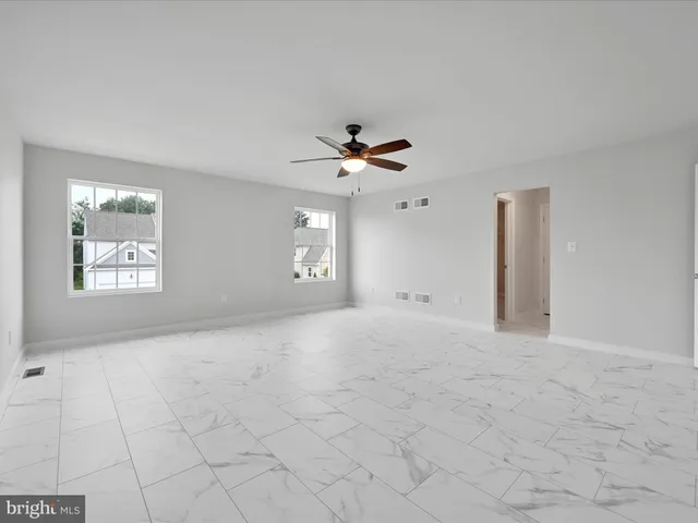 en view of an empty room with a window