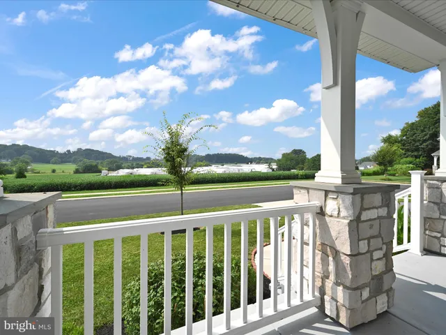 a view of a street from a balcony