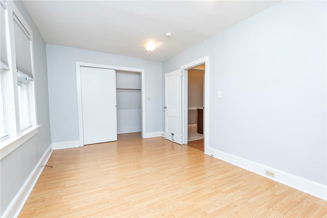 280 Oak Road Bangor, PA 18013 - Photo 20 of 52 Warm wood flooring and clean white trim highlight this comfortable bedroom.