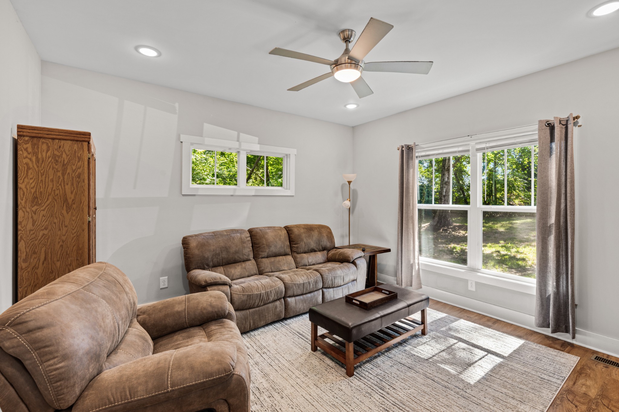 115 North Adams Street Adams, TN 37010 - Photo 8 of 44 a living room with furniture and a large window