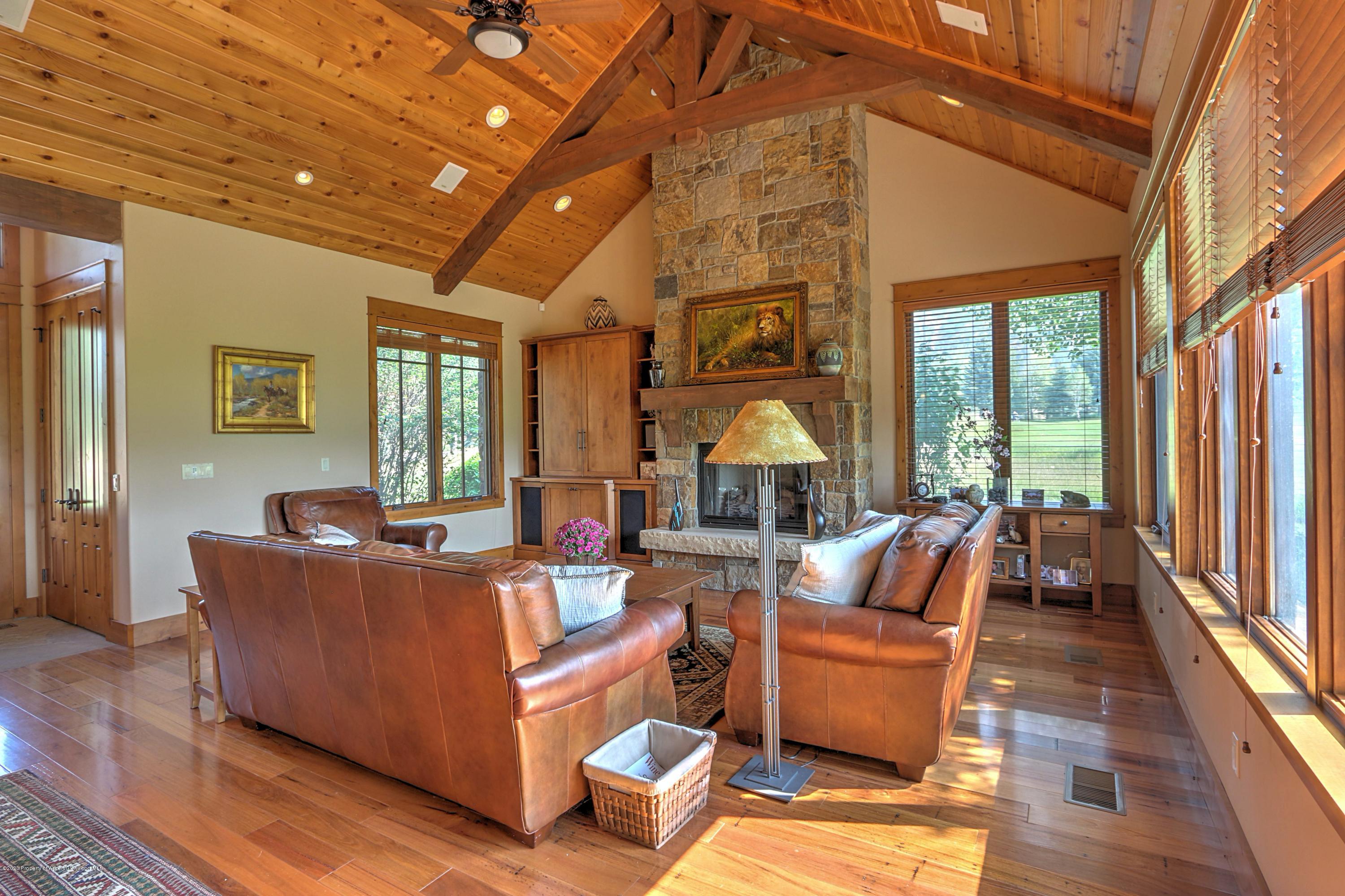 54 Diamond A Ranch Road Carbondale, CO 81623 - Photo 10 of 43 a living room with furniture and a large window