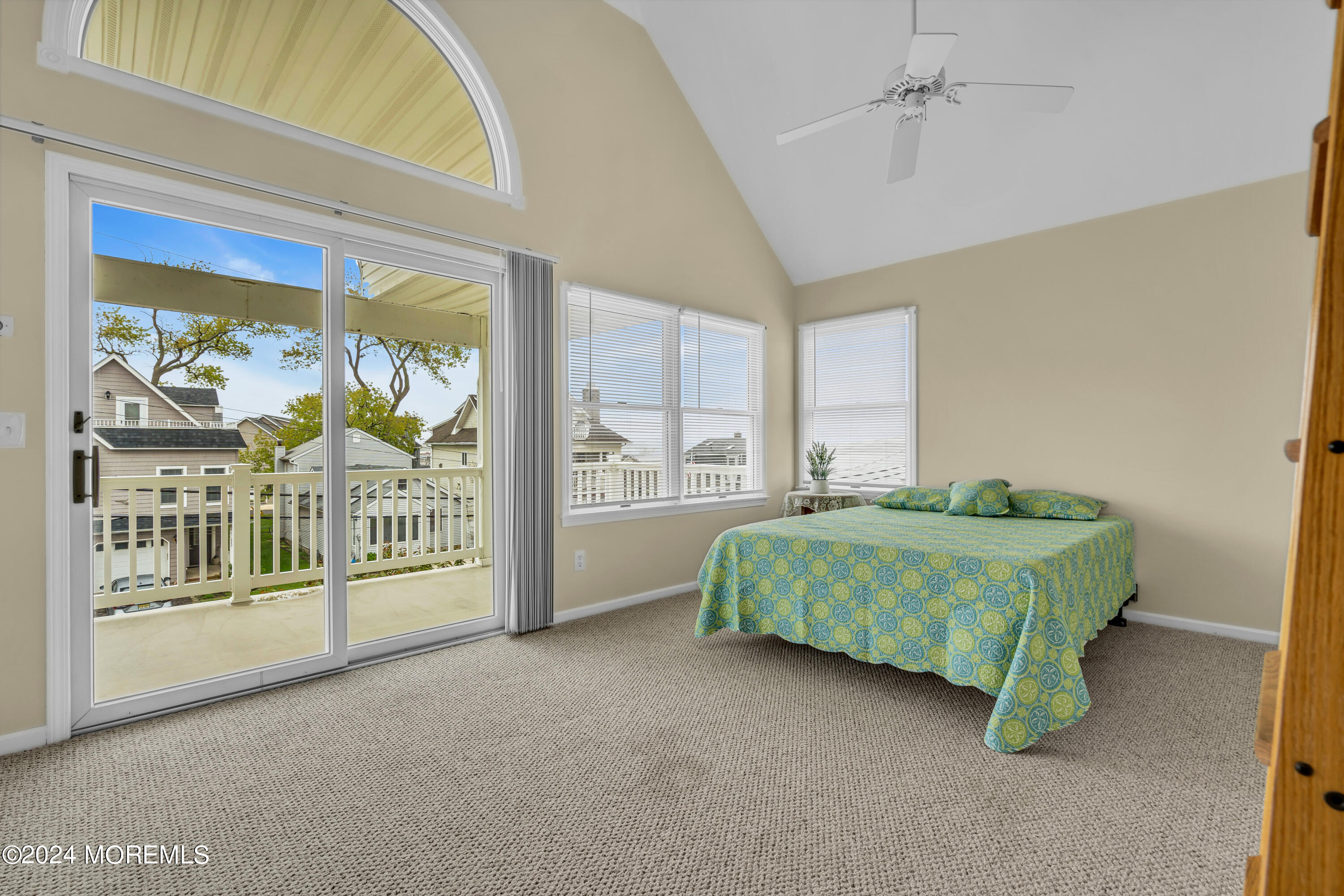 564 Perch Avenue Manasquan, NJ 08736 - Photo 20 of 49 a bedroom with a bed and large window