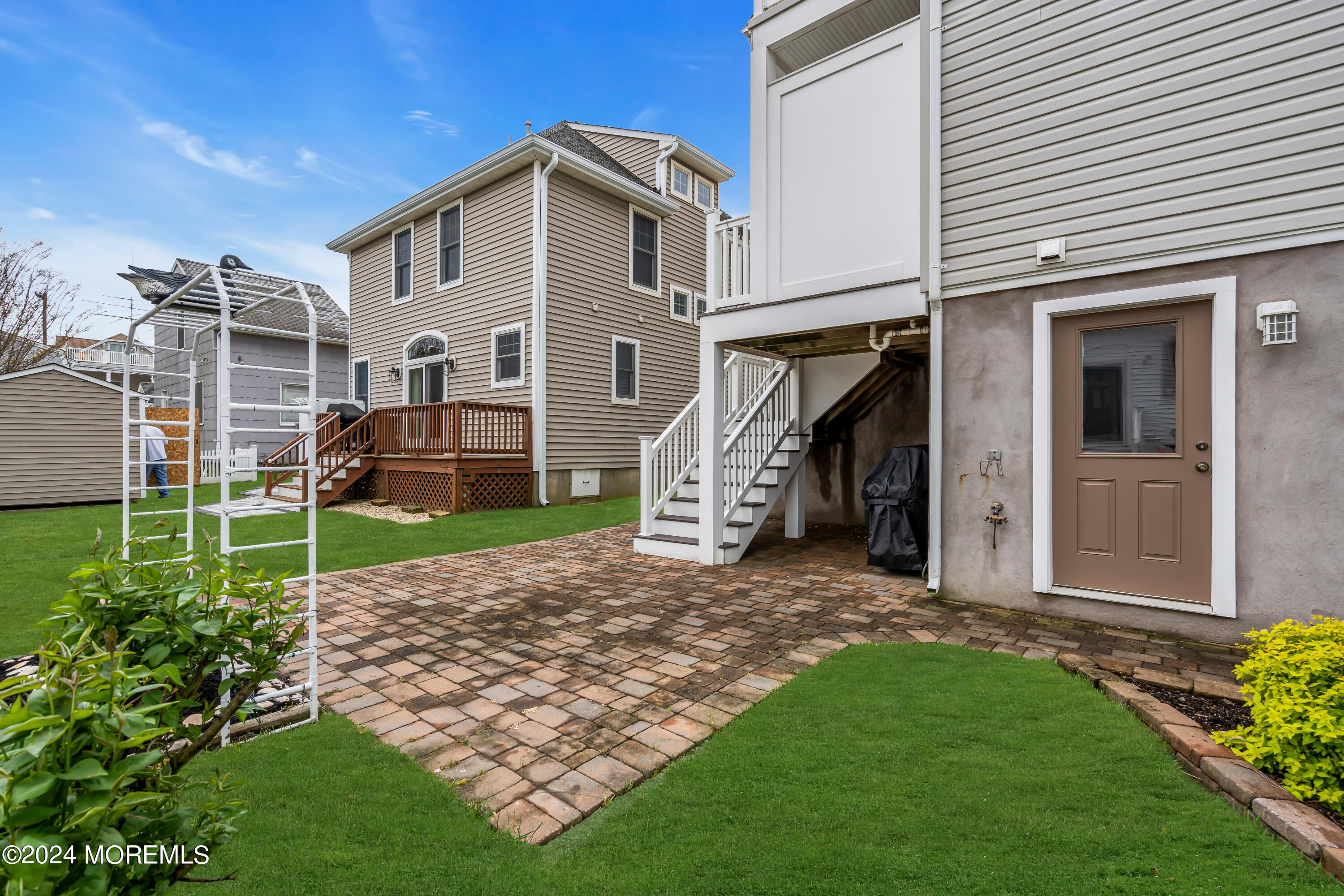 564 Perch Avenue Manasquan, NJ 08736 - Photo 28 of 49 a view of a house with a yard