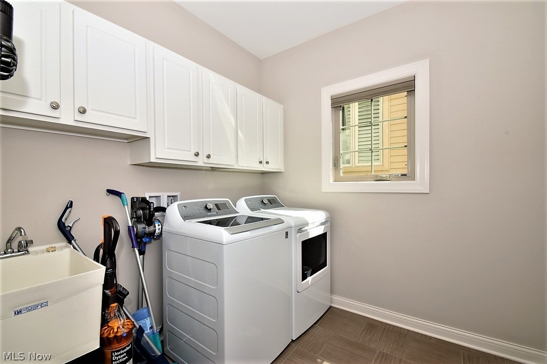 5125 River Creek Road Cleveland, OH 44124 - Photo 18 of 33 First floor laundry mud room has storage and laundry tub