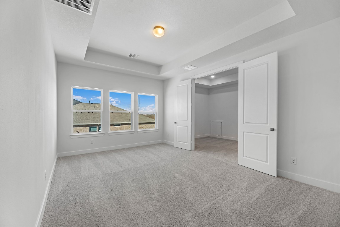 113 Meadow Beauty Lane Georgetown, TX 78633 - Photo 15 of 23 a view of an empty room with a window