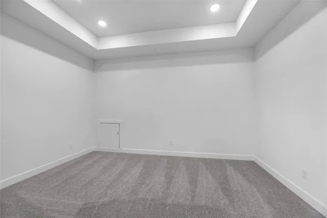 a view of empty room with windows