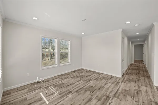 a view of an empty room and window
