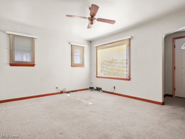 253 Wilson Street Struthers, OH 44471 - Photo 7 of 12 Carpeted spare room featuring ceiling fan