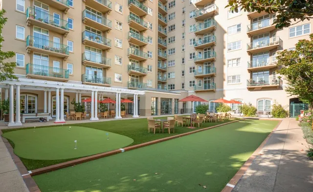 front view of a building with a yard