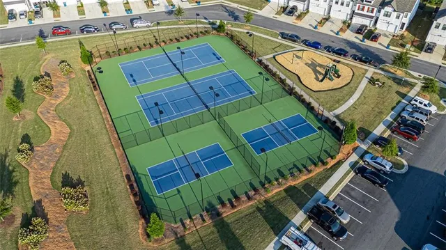 an aerial view of a house with lake view
