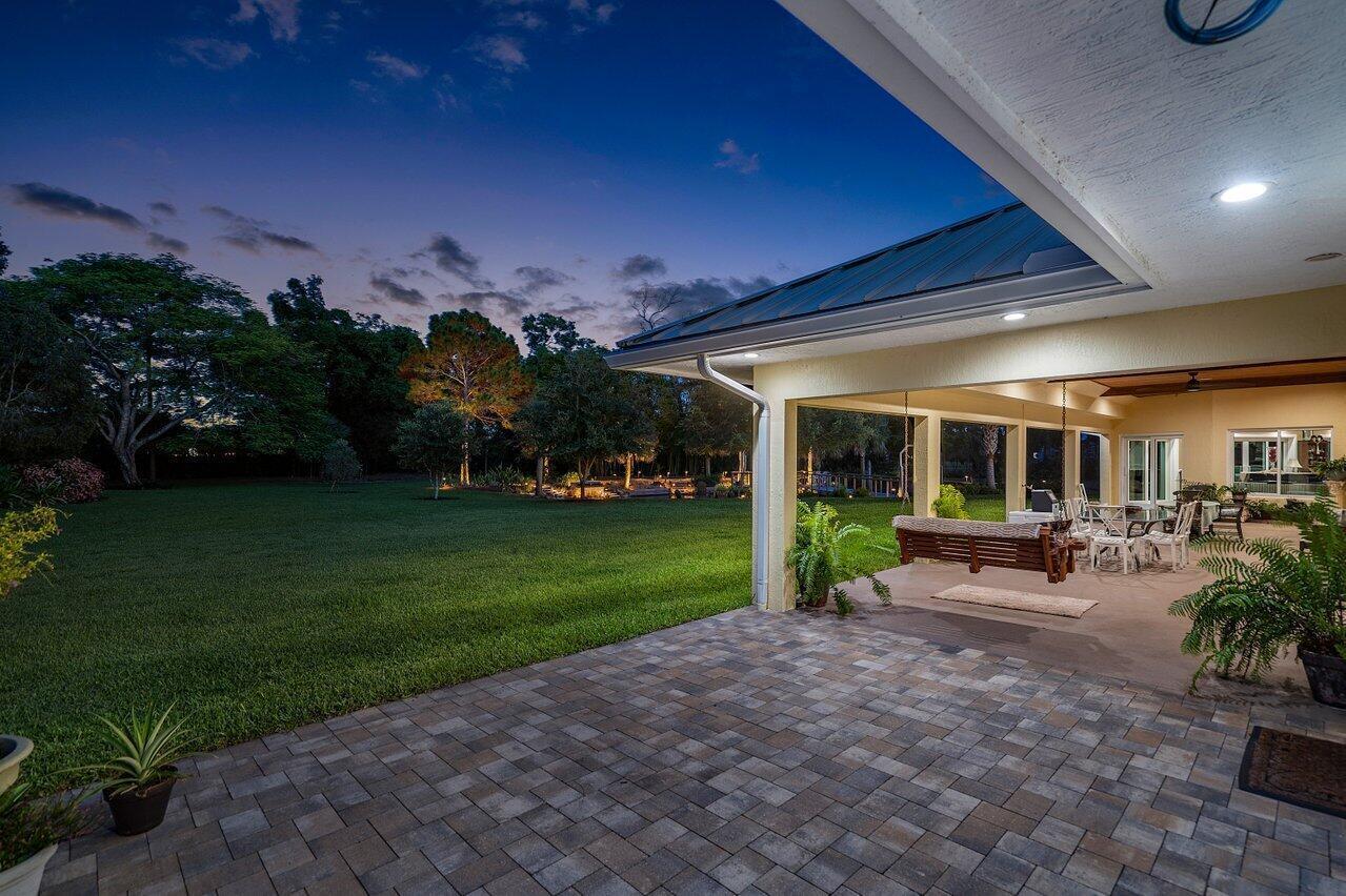 6624 Dillman Road Greenacres, FL 33413 - Photo 10 of 77 Twilight Backyard