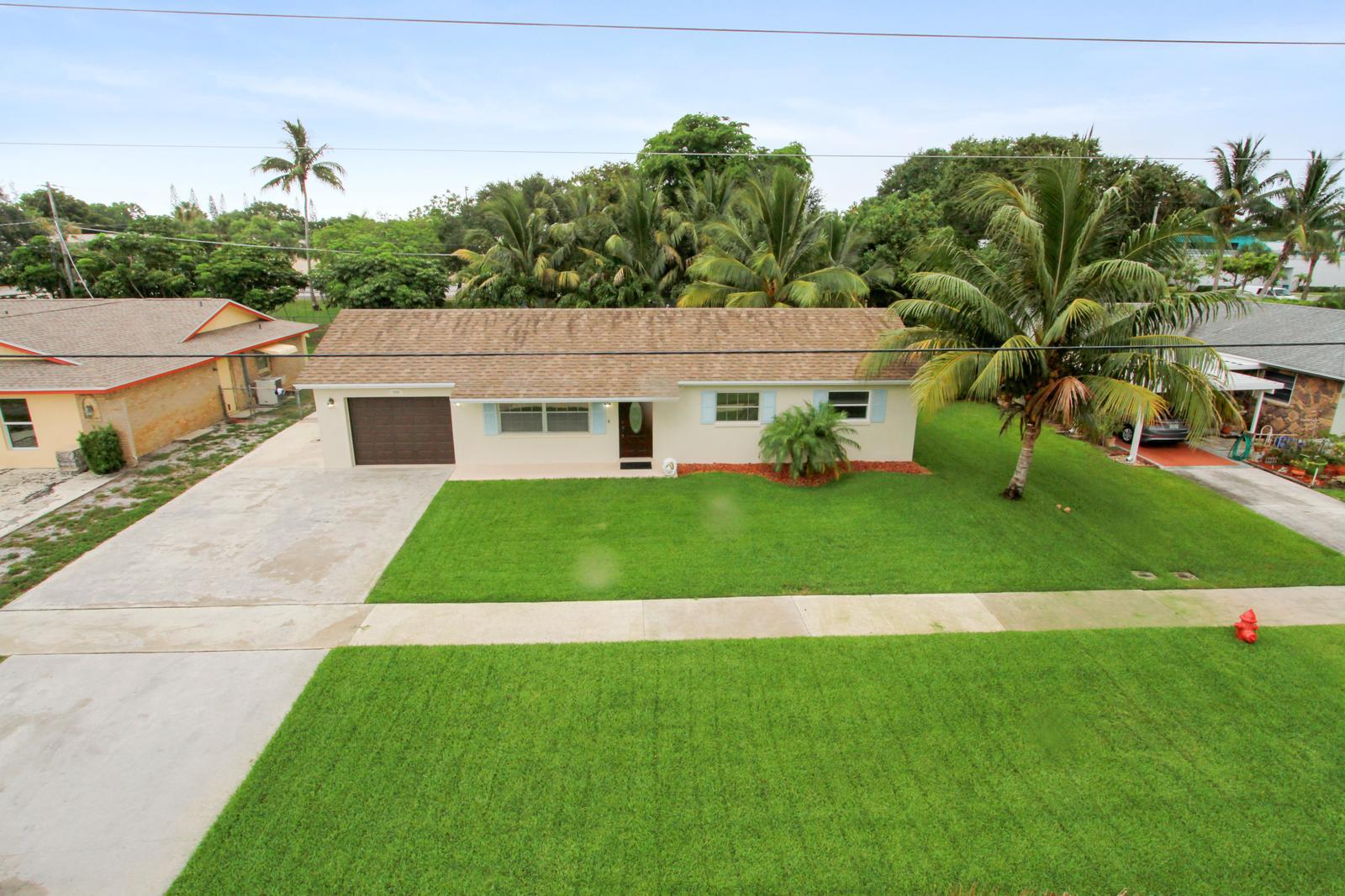 444 Davis Road Palm Springs, FL 33461 - Photo 14 of 14 1_facade