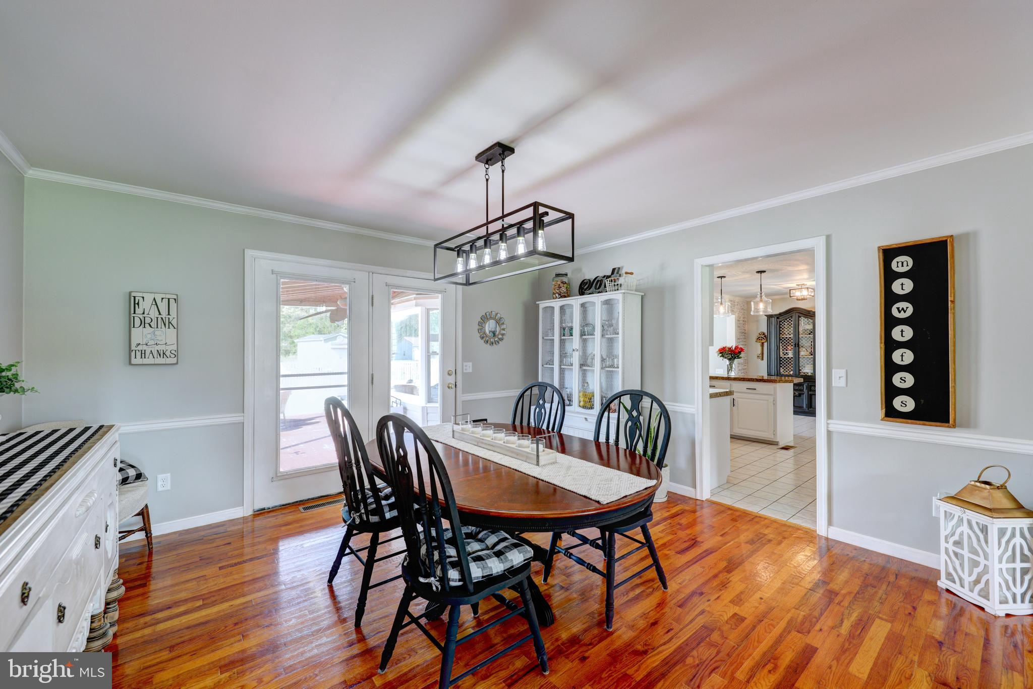 22816 Deep Branch Road Georgetown, DE 19947 - Photo 18 of 85 Dining room with deck access