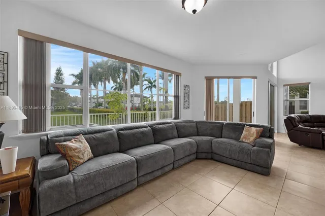 a kitchen with stainless steel appliances granite countertop a stove top oven a sink and dishwasher