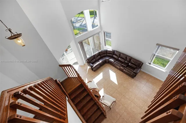 a bedroom with a bed and a television